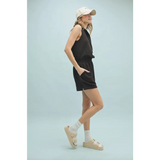 Black sleeveless romper with elastic waist and polished prints from Lexie Athletic Collared Romper