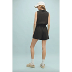 Black sleeveless romper with elastic waist in polished prints from Lexie Athletic Romper