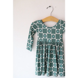 Green and white checkered long-sleeve dress on a hanger, perfect Lily Flower Check style