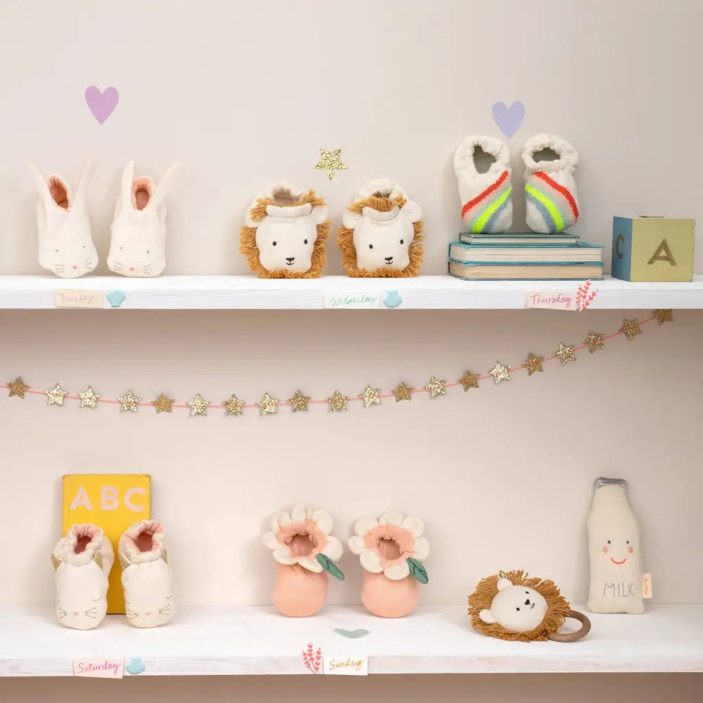 Cute white bunny figurines on shelf, polished prints for stylish moms clothes
