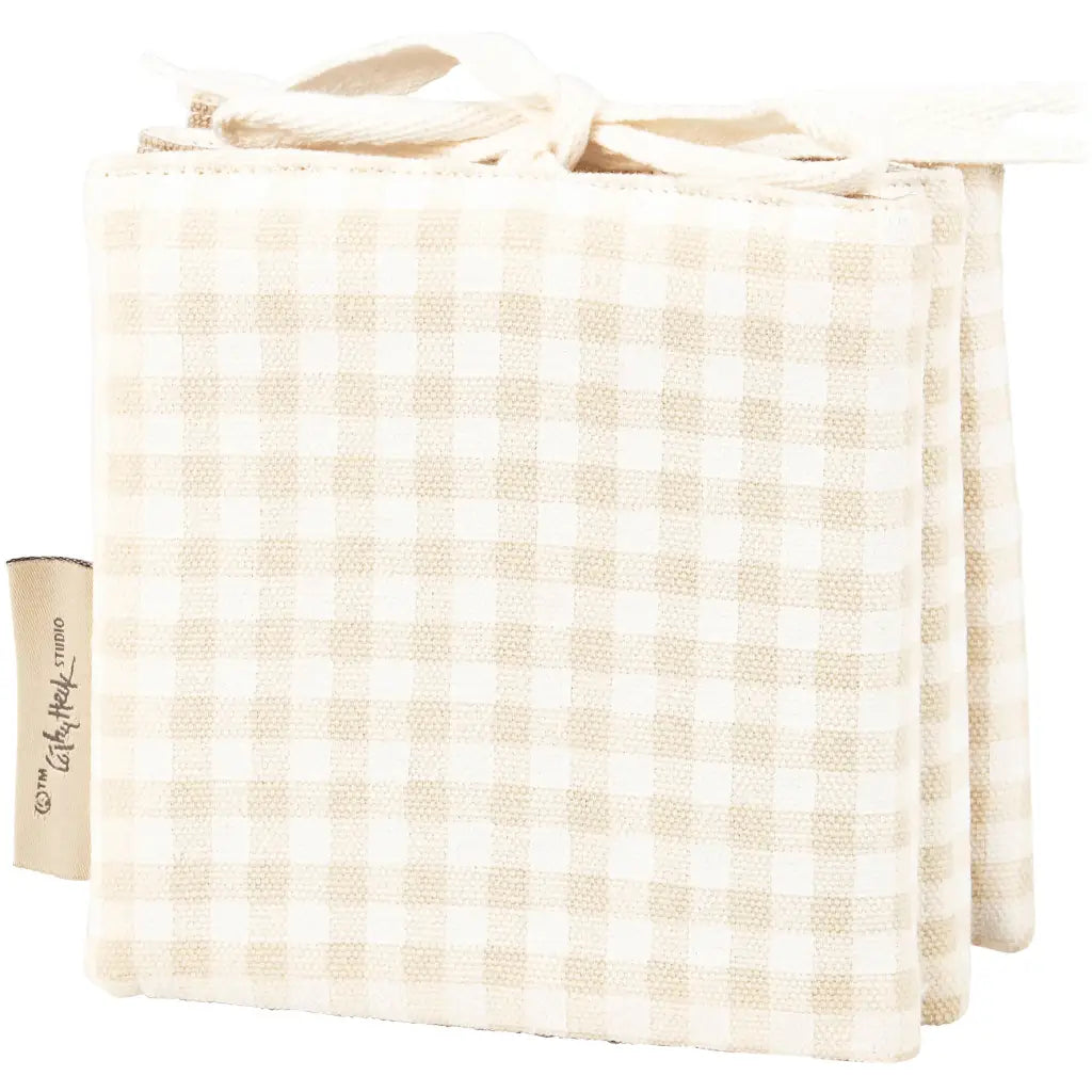 Beige and white gingham quilted fabric squares tied with ribbons for Little Farm Soft Book
