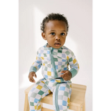 Toddler in pastel checkered zippered jumpsuit from Little Houses Bamboo Baby Sleeper