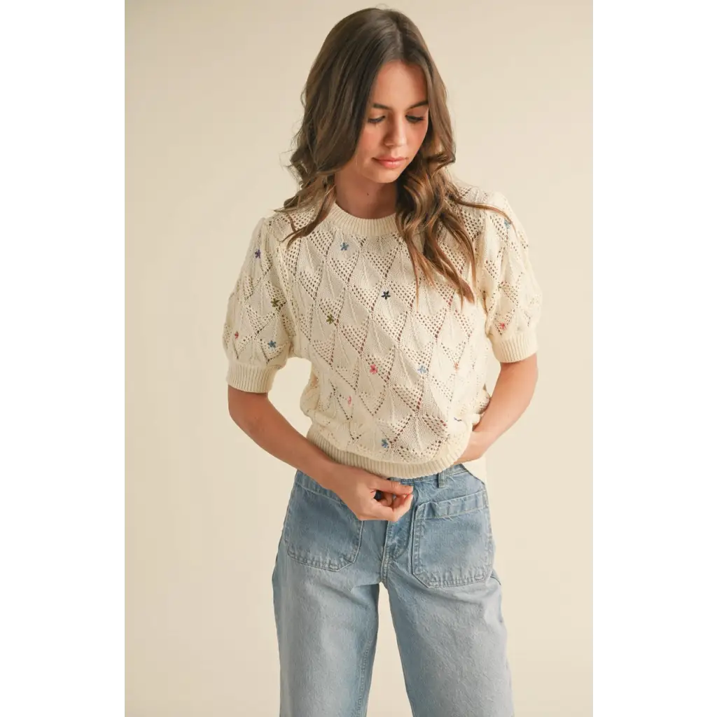 Off-white Liv Pointelle Knit Sweater with colorful floral embroidery and star details