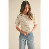 Off-white Liv Pointelle Knit Sweater with colorful floral embroidery and star details