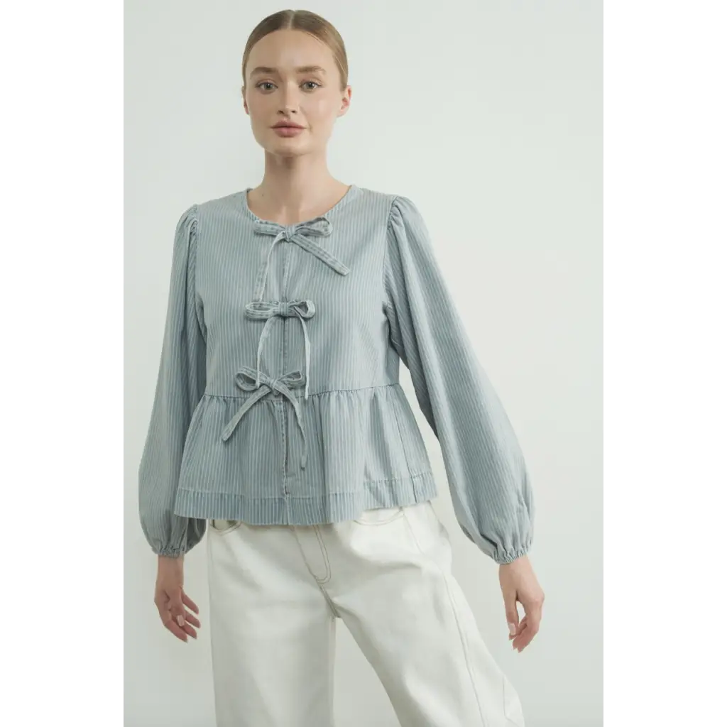 Light Blue Peplum Blouse featuring Sleeve Denim Bow details and puffed sleeves