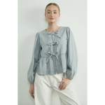 Light Blue Peplum Blouse with Sleeve Denim Bow and puff sleeves for a stylish look