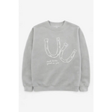 Gray sweatshirt with soft white horseshoe graphic and Luck looks good on you print