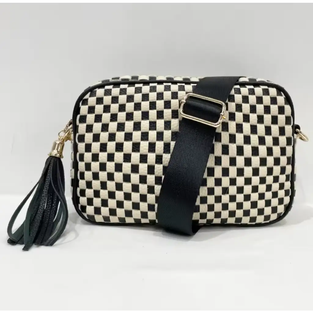 Black and white checkered woven camera bag with leather tassel detail