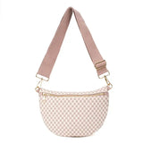 Pink checkered Lucy Woven Sling Bag made from vegan leather with an adjustable wide strap