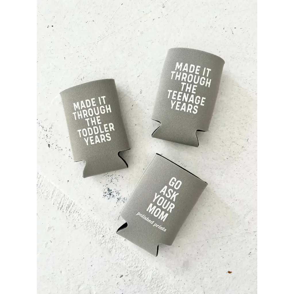 Three gray koozies with funny parenting quotes for surviving teenage years by Polished Prints