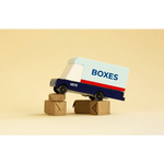 Toy mail van delivering boxes for fun with blue and white design