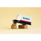 Toy mail van delivering boxes for fun with blue and white design