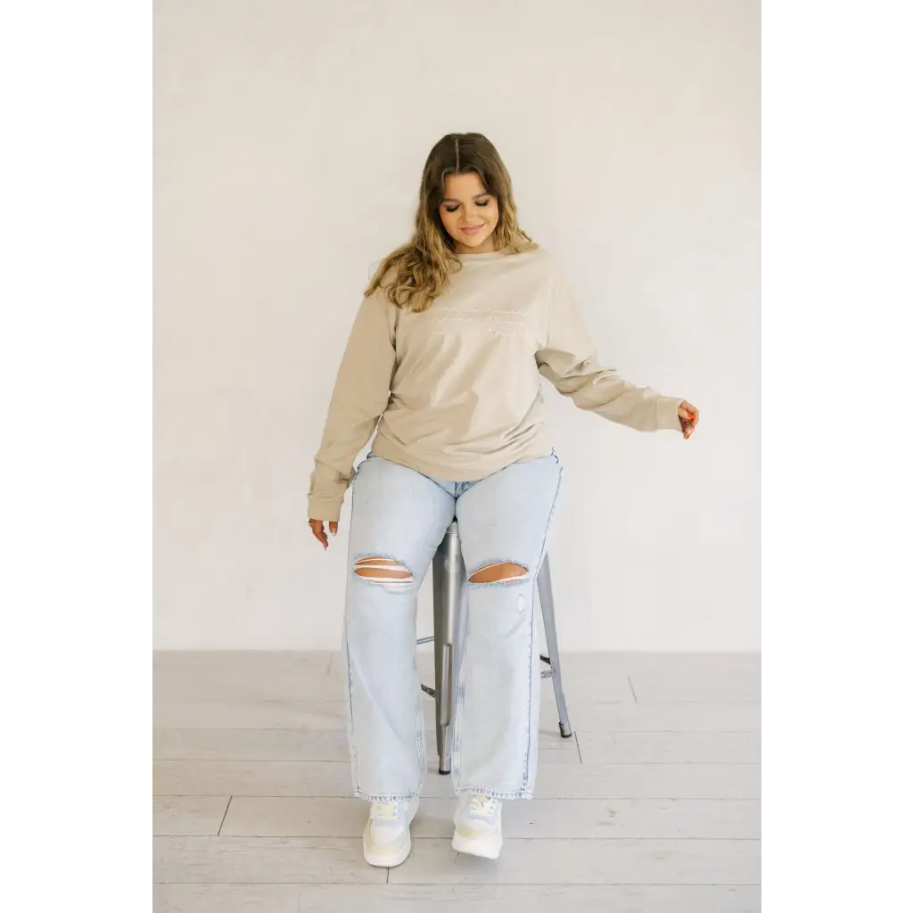 Beige Crewneck Sweatshirt with Chainstitch Embroidered Detail, organic cotton, and white sneakers