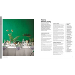 Elegant Martha Stewart white floral dinnerware on green cloth