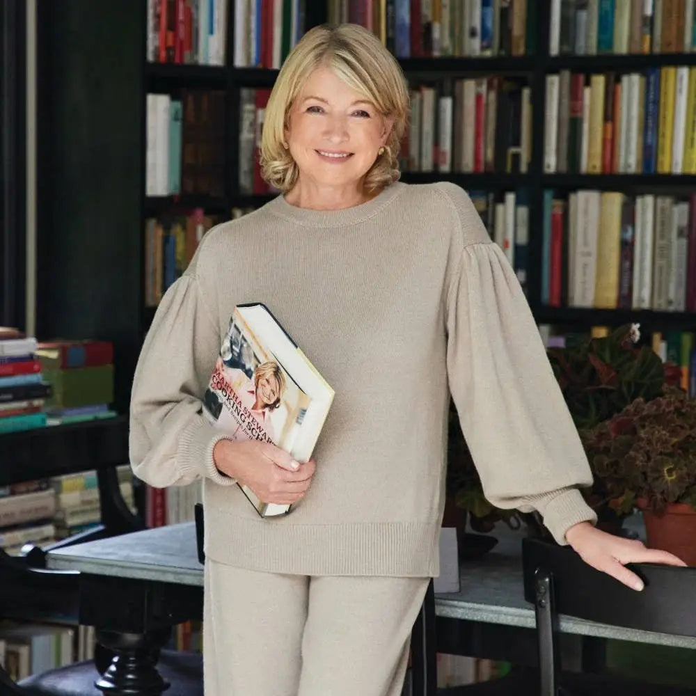 Martha Stewart gardening handbook in beige ribbed knit sweater with puffed sleeves
