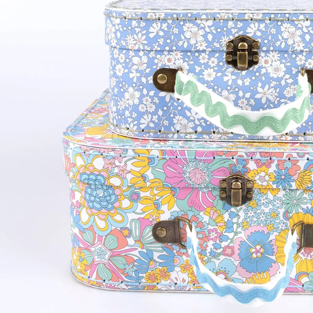 Floral suitcase with ricrac embellishment, cream stripes, brass hardware, green handle