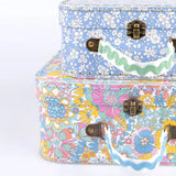 Floral suitcase with ricrac embellishment, cream stripes, brass hardware, green handle