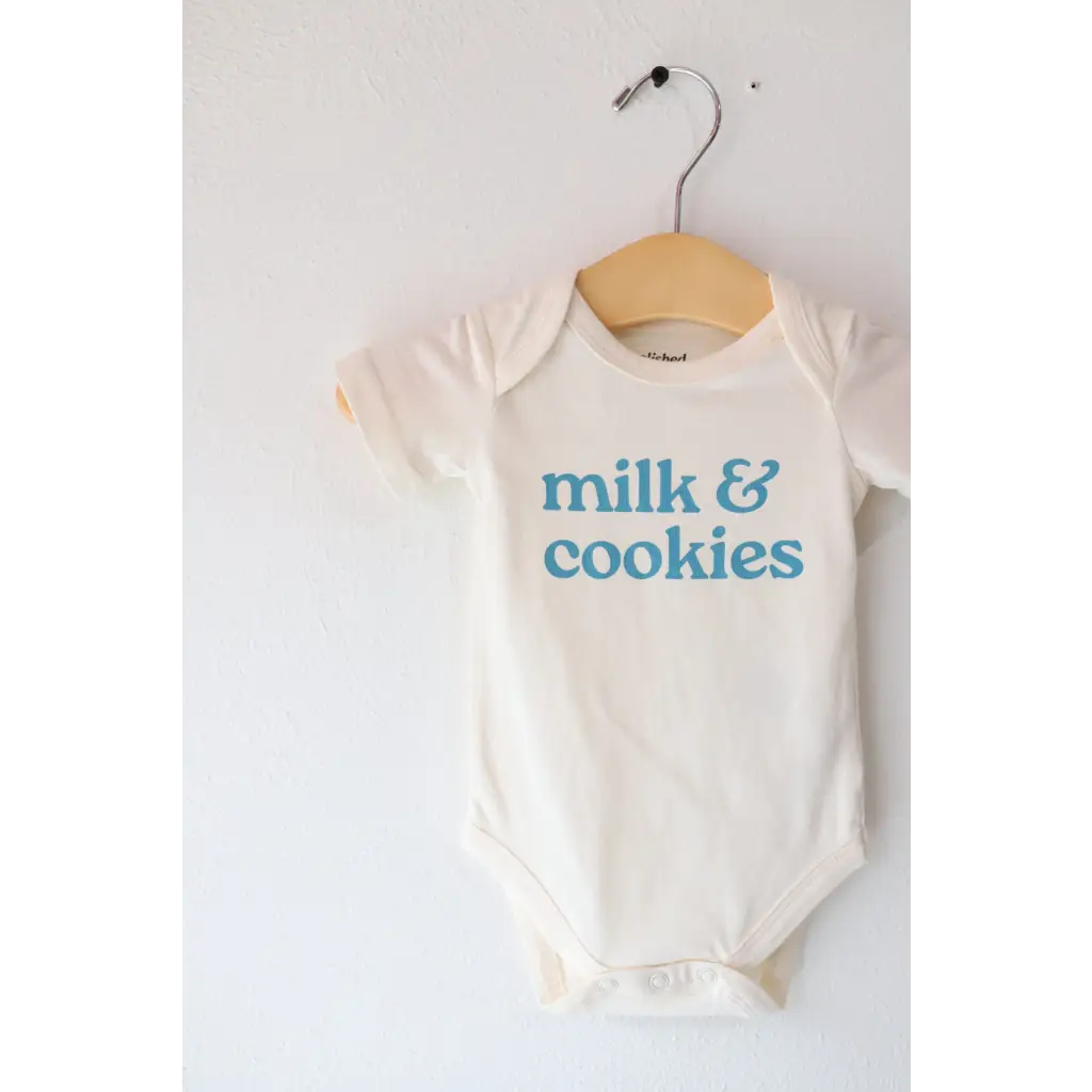 White baby gender neutral onesie in organic cotton with milk and cookies blue print