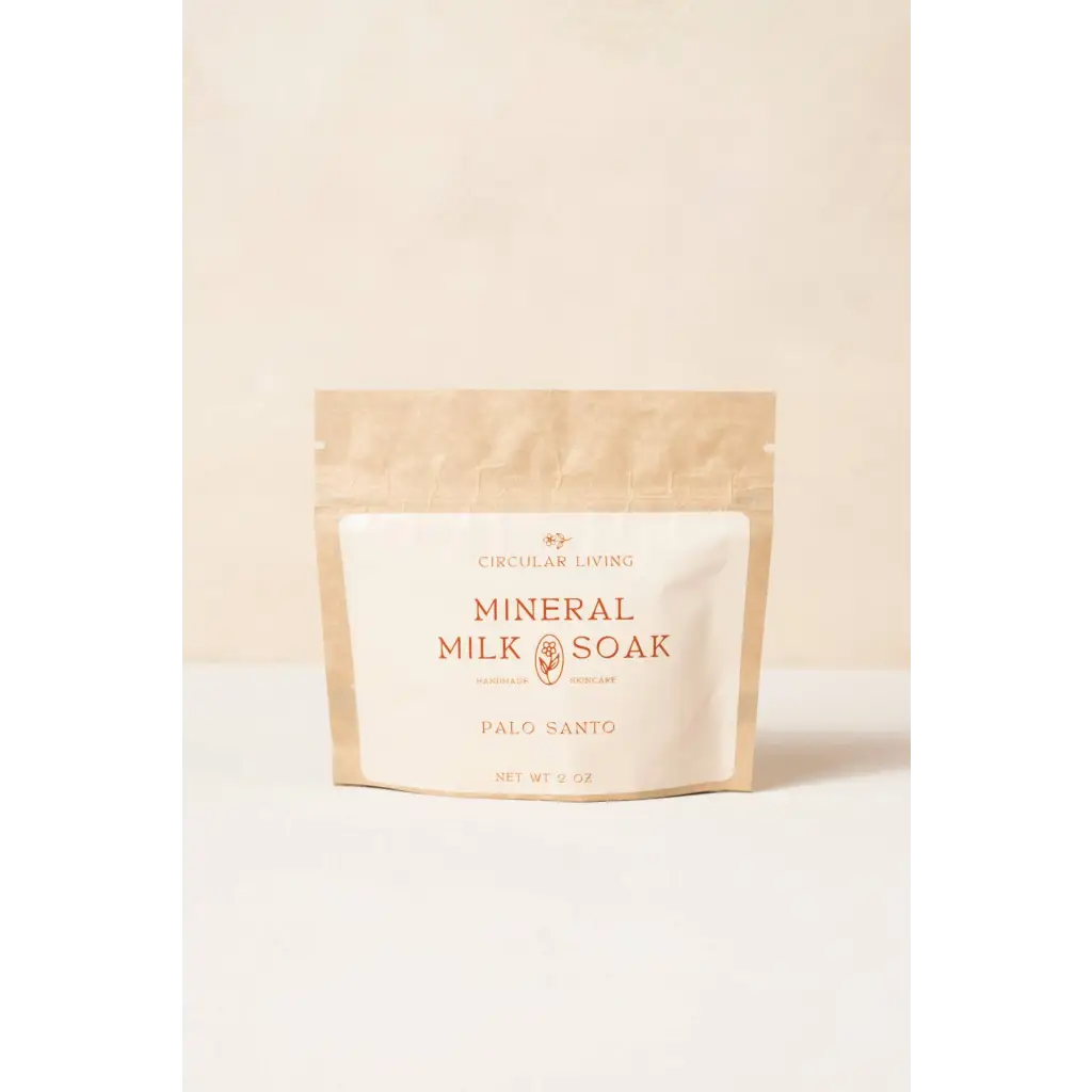 Palo santo mineral milk soak sachet in white gold packaging