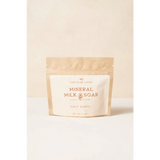 Palo santo mineral milk soak sachet in white gold packaging
