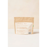 Beige green tea bag with cartoon design for Mineral Milk Soak Palo Santo