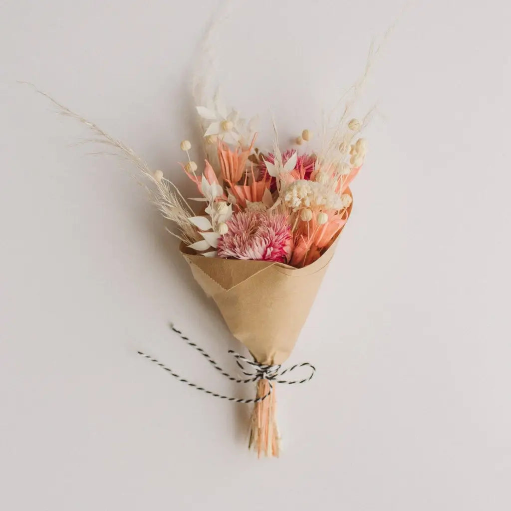 Mini dried flower bouquet in pink cream hues with twine bow
