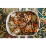 Mini dried flower bouquets in white woven basket