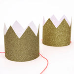 Mini gold glitter crown with white accents and red band
