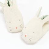 Cute cream bunny booties with green accents and polished prints for moms