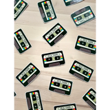 Scattered mix tape stickers on polished prints perfect for stylish womens clothes and moms