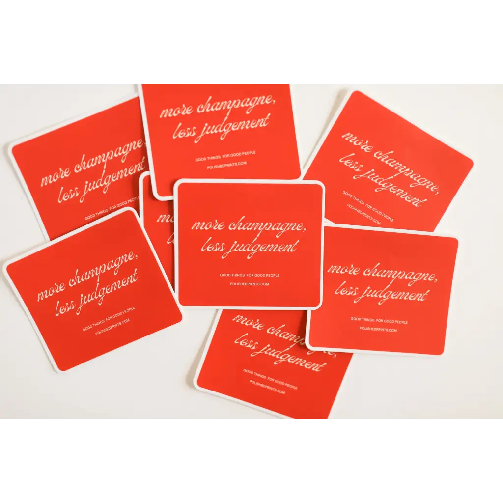 Red coasters with white text scattered, showcasing the Playful Judgement Waterproof Sticker