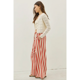 Woman wearing Morocco Stripe Wide-Leg Pants with elastic waistband and polished prints