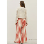 Woman in cozy white knit sweater and Morocco Stripe Wide-Leg Pants with elastic waistband