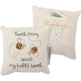 Cream-colored tooth fairy pillow with bees, tooth applique, and babee tooth text