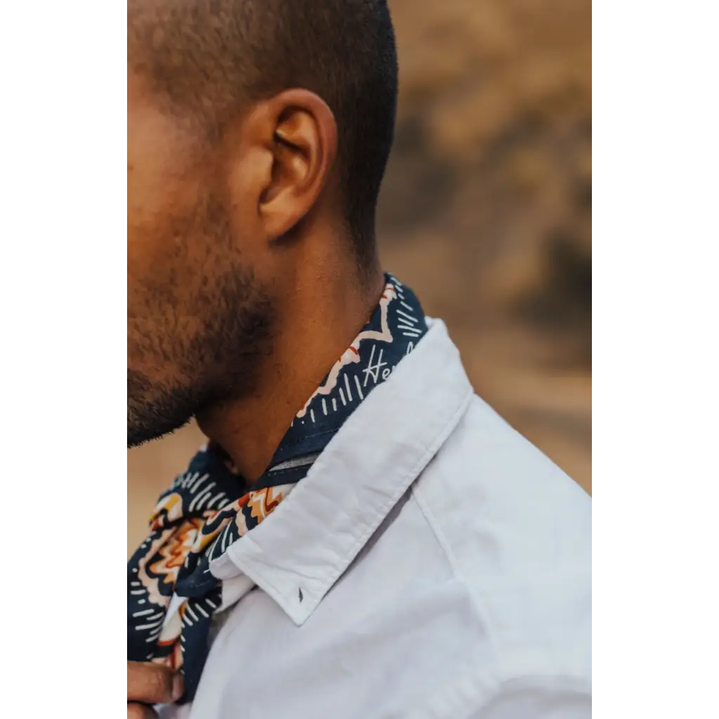 Floral Silk Scarf 22x22 inches with yellow flowers and navy accents styled with a collared shirt