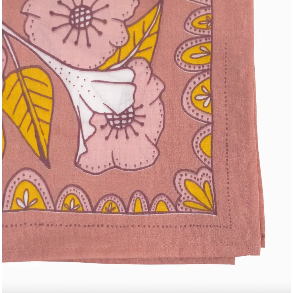 Evangeline Silk Scarf features a pink floral bandana with yellow leaf accents