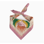 Martha Bandana features a stylish pink-bordered design with polished prints in vibrant colors