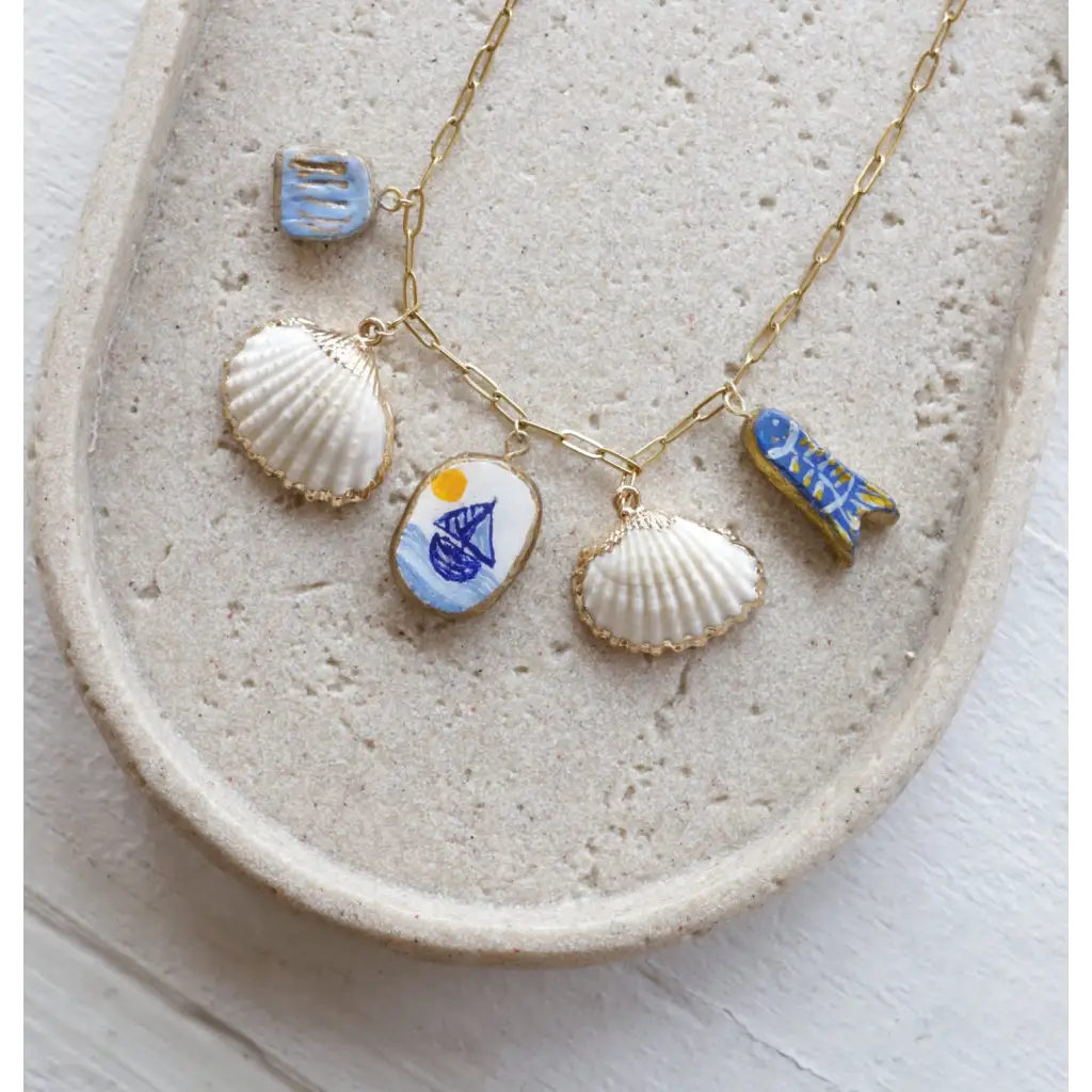 Gold chain necklace with clay charms and shell accents in No. 1 By the Ocean product