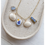 Gold chain necklace with clay charms and shell accents in No. 1 By the Ocean product