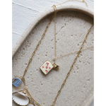Gold layering necklaces with MOM pendant, heart, seashell, and blue clay charms