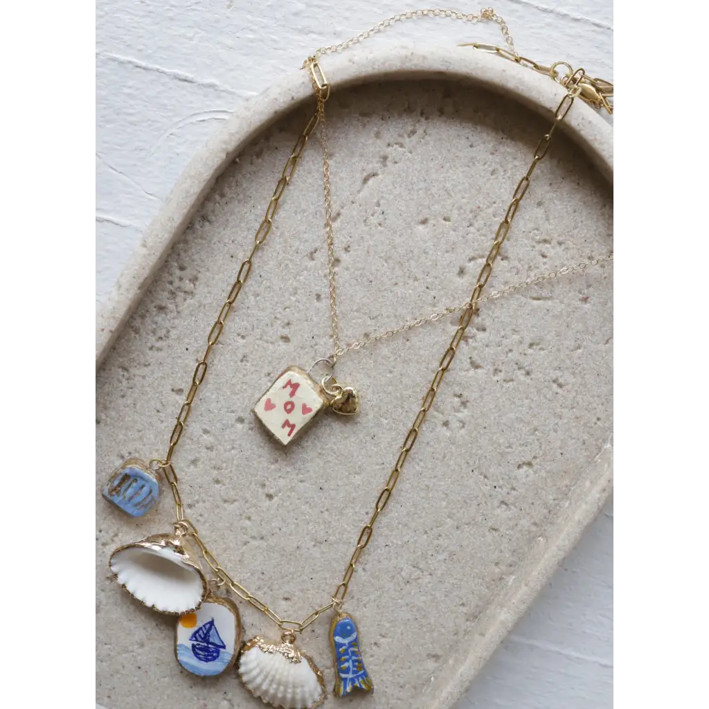 Gold layered necklaces with clay seaside charm pendants for the No. 11 For Mom Necklace