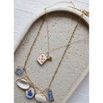 Gold layered necklaces with clay seaside charm pendants for the No. 11 For Mom Necklace