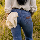 Blue denim jeans with leather patch, perfect for styling with Elena Bandana in Polished Prints