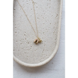 Gold chain necklace with horseshoe and heart clay charms from No. 12 Lucky Girl necklace