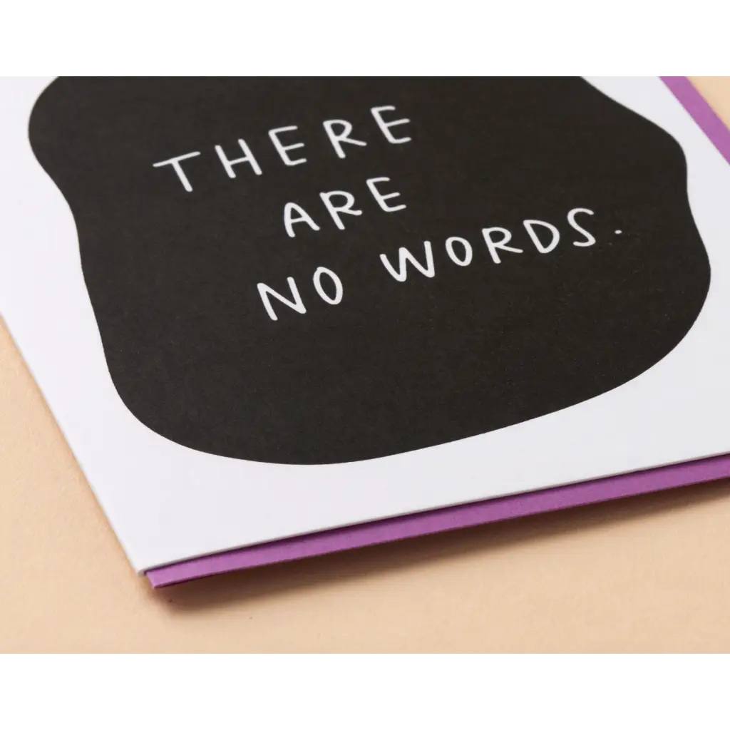 There are no words text on a black surface of a sympathy letterpress greeting card