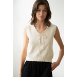 Woman in cream knit vest from Olivia V-Neck Knit Vest with Neck Strap, stylish womens clothes