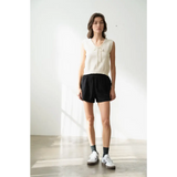 Woman wearing Olivia V-Neck Knit Vest with Neck Strap, stylish womens clothes look