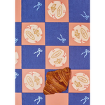 Flaky golden-brown croissant on Oui Croissants Coasters with stylish prints for moms