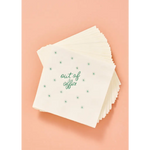Stack of white cocktail napkins with green star pattern for stylish womens clothes or parties