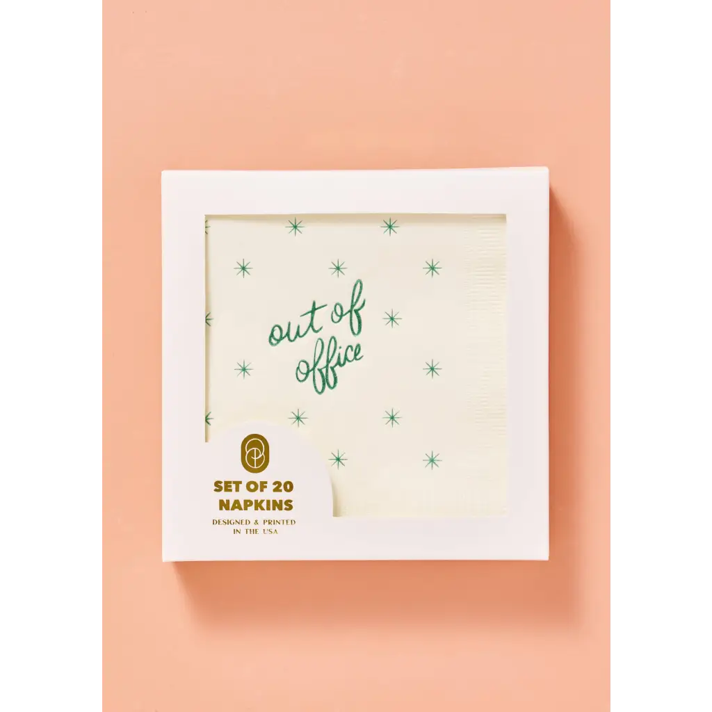 Cream-colored Out of Office cocktail napkins with stylish polished prints and green stars